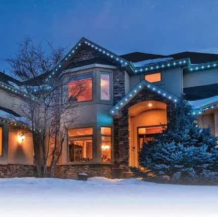 Oelo lighting installation example showing a home illuminated in winter